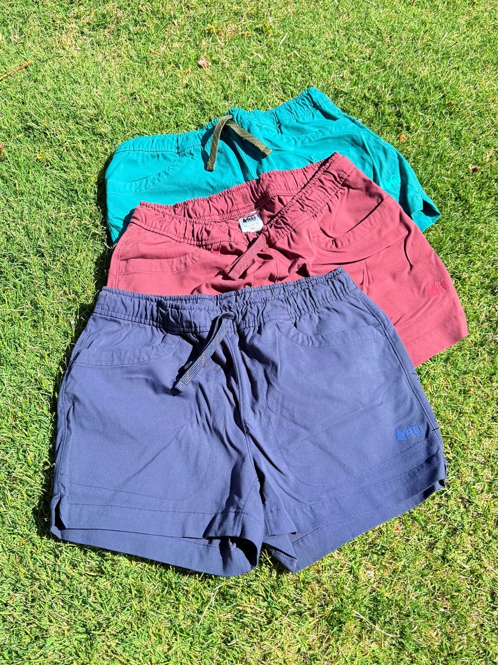 REI Drawstring Active Shorts Trio - Blue, Teal, Brick